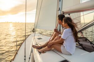 Outdoor couple sailing in sunset